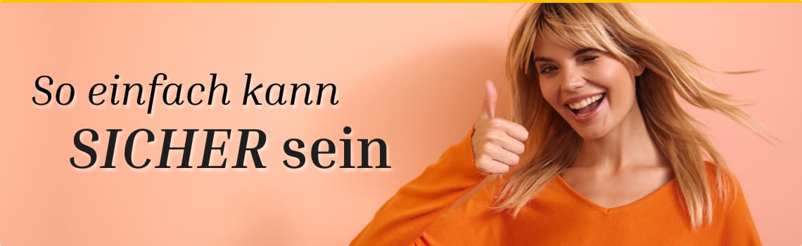 So einfach kann SICHER sein – Frau in orangefarbenem Pullover zeigt Daumen hoch vor pfirsichfarbenem Hintergrund
