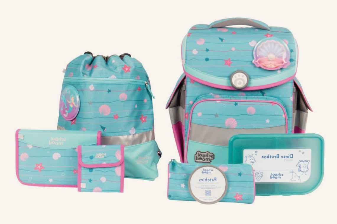 Schulranzen-Set in Türkis mit Muschel- und Sternmotiven, bestehend aus Rucksack, Turnbeutel, Brotdose, Federmäppchen und Geldbörse