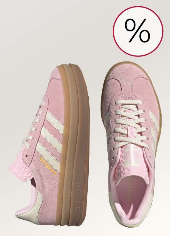 Prozent-Symbol – rosa Sneaker mit weißen Streifen und brauner Sohle, einer seitlich und einer von oben gezeigt