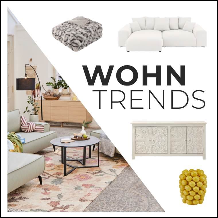 WOHN TRENDS – Wohnzimmer mit gemütlicher Einrichtung, Sofas, Decke, Kommode und Deko-Objekt.