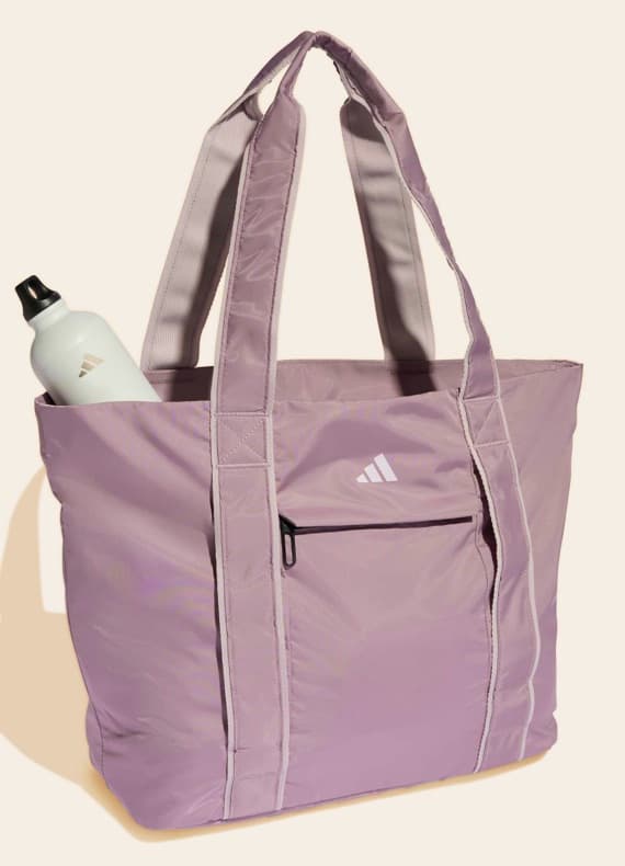 Rosa Adidas-Shopper mit breiten Henkeln, Fronttasche mit Reißverschluss und weißer Trinkflasche in der Seitentasche